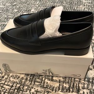 A new day black loafers size 6.5 but fit 7.5